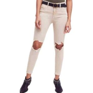 Free People tan skinny jeans w/ cuts at knees